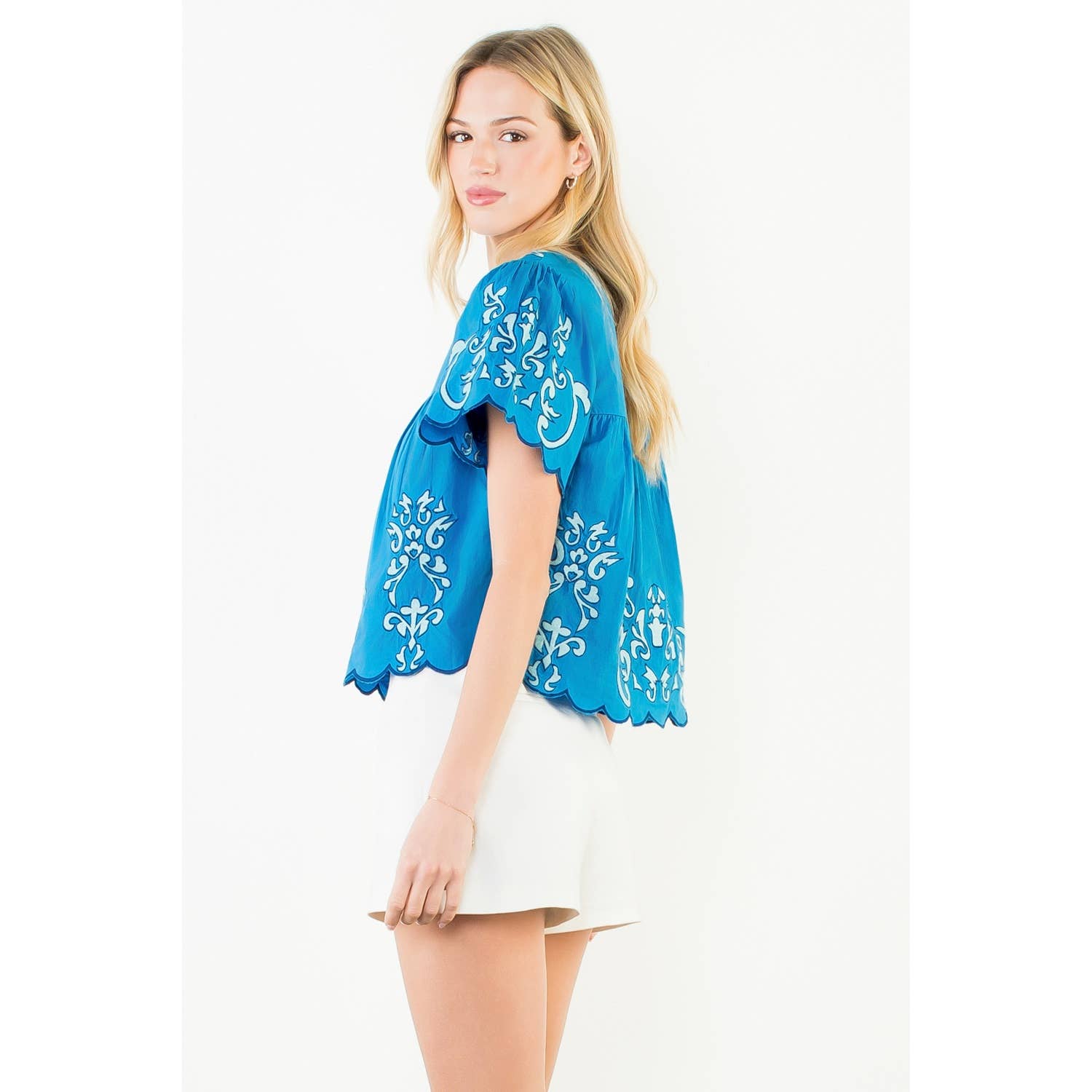 Cobalt blue Harbor Breeze Top with white scrollwork embroidery, scalloped edges, and beaded neckline, relaxed babydoll fit in 100% cotton
